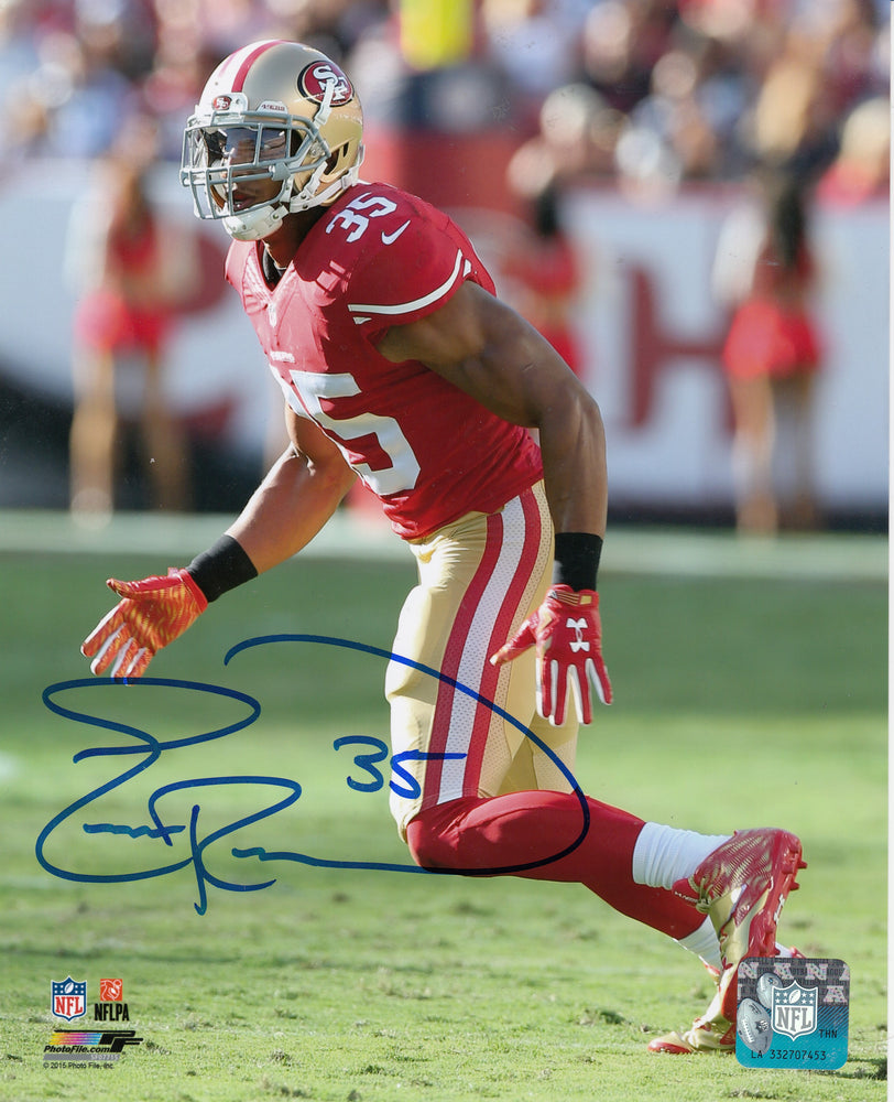 Eric Reid San Francisco 49ers Autographed 8x10 Photo (Vertical, Running, Red Jersey)